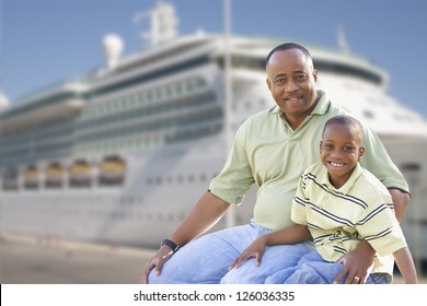 Happy African American Father And Son In Front Of Cruise Ship.