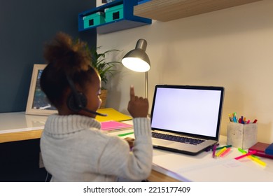 Happy African American Girl Learning, Using Laptop With Copy Space And Headphone At Home. Home Education, Distance Learning.