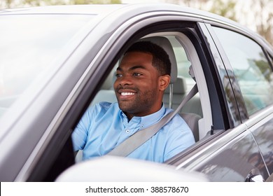 Happy African American Male Driver In Car