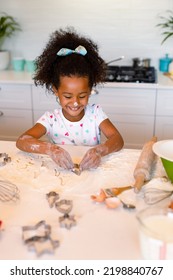 Happy African American Messy Girl Baking In Kitchen. Baking And Cooking, Childhood And Leisure Time At Home.