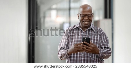 Similar – Image, Stock Photo Black man looking at camera through light filter