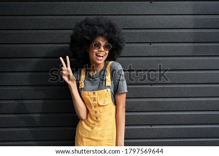 Similar – Image, Stock Photo Street of Peace is the name of the street sign on the wall. A part of a window is still visible.