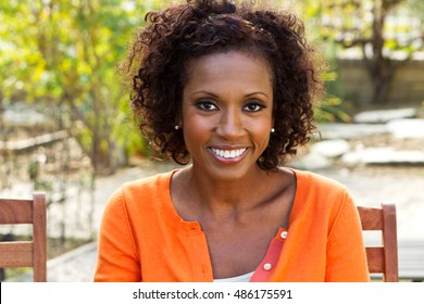 Happy African American Woman - Shutterstock ID 486175591