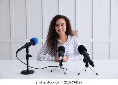 Happy African American Woman Giving Interview At Official Event