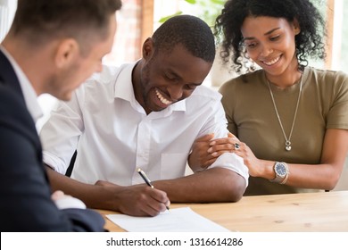 Happy african black family couple customers renters tenants sign mortgage loan investment agreement or rental insurance contract meeting realtor lender landlord making real estate sale purchase deal - Shutterstock ID 1316614286