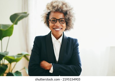 Happy African Business Woman Working Inside Modern Office - Focus On Face