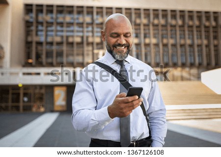 Similar – Image, Stock Photo adult man in black clothes stands upright with strained muscles