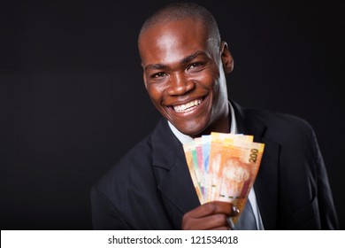 Happy African Businessman With South African Cash Notes