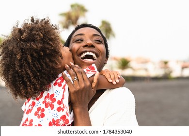 Happy African Family On The Beach During Summer Holidays - Afro American People Having Fun On Vacation Time - Parents Love Unity And Travel Lifestyle Concept