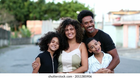 Happy African Family Portrait Standing For Photo Outside. Cheerful Black Parents And Children