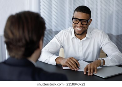 Happy African Intern Meeting With Mentor, Company Coach, Listening To Teacher, Smiling, Laugh. Job Seeker Meeting Business Owner For Interview. Manager, Banker Giving Consultation To Client