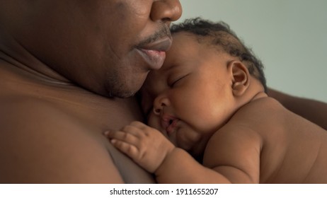 Happy African Man With His Little Baby