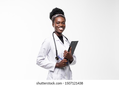 Happy African Medical Intern Doctor Writing On Clipboard