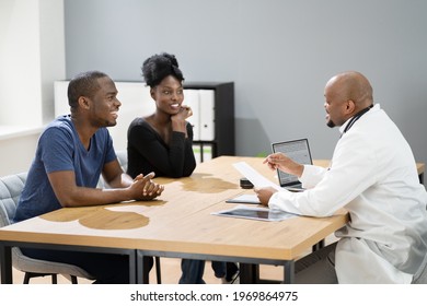 Happy African Pregnant Couple Patient At Doctor