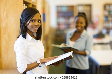 Happy African University Student In Reading A Book