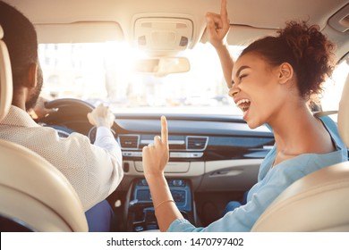 Happy Afro Couple Driving In Car And Girl Singing Song, Enjoy Tavel By Auto