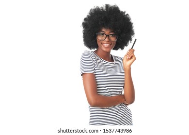 Happy Afro Woman With A Pen Isolated On White Background.