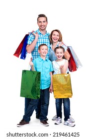 Happy American Family With Children Holding Shopping Bags - Over White Background