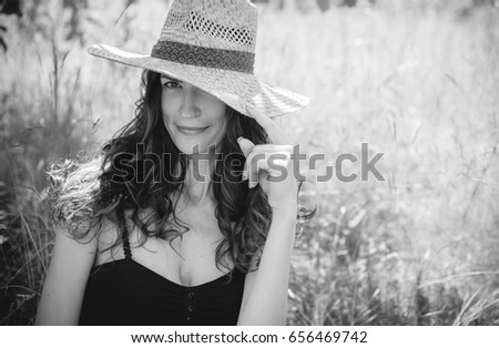 Similar – Image, Stock Photo Smiling girl with a hat pulling from her boyfriend hand in the street to take a walk.