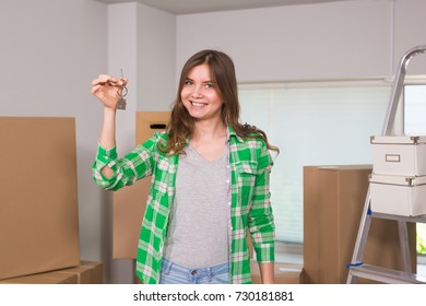 Happy Apartment Owner Or Renter Showing Keys Of New Home