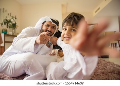 Happy Arabian Family Having Fun At Home