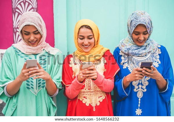 Happy Arabian Friends Using Smartphones Outdoor Stock Photo 1648566232 ...