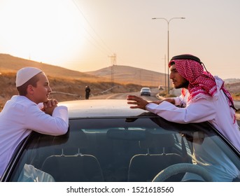 Happy Arabic Family Outside The Car Window Waving At Each Other