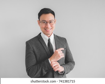 Happy Asian Boss Manager Business Man Wears Black Suit In Relax Pose.