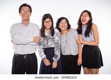 Happy Asian Business Man With Family Smiling And Laughing On White Background Studio Setting