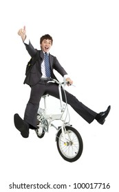 Happy Asian  Businessman On A Bicycle Isolated On White Background