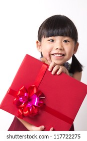 Happy Asian Child Girl With Red Gift Box For Christmas Theme