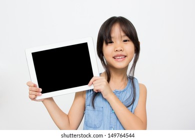 Happy Asian Child With Tablet Computer