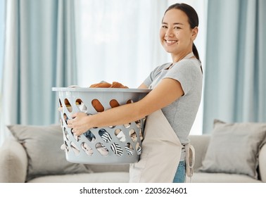 Happy Asian Cleaner Woman With Laundry Working For Home, House Or Hotel Hospitality Cleaning Help Service Agency. Japanese Girl Maid Or Worker Smile In Apartment With Dirty Clothes In Washing Basket