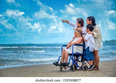 Happy Asian Diversity Generation Family Standing On Tropical Beach In Summer In Sunset