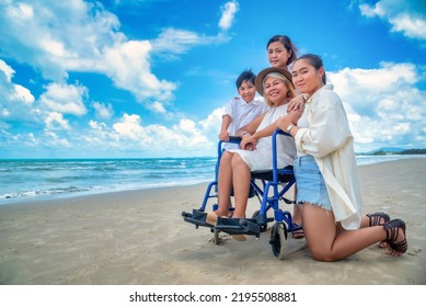 Happy Asian Diversity Generation Family Standing On Tropical Beach In Summer In Sunset