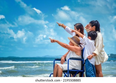 Happy Asian Diversity Generation Family Standing On Tropical Beach In Summer In Sunset