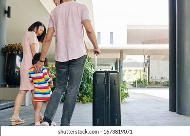 Happy Asian Family With Big Suitcase Leaving Hotel Andfter Staying For Some Days