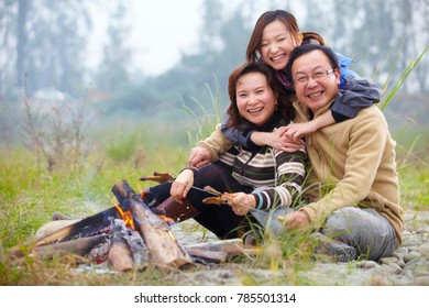 Happy Asian Family Camping Roast Outdoor