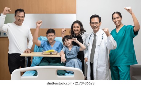 Happy Asian Family , Doctor And Nurse Are Raising Hands Congratulate A Patient Who Has Recovered In The Hospital, Cheerful Family And Doctor Team Feeling Glad When Boy Getting Well In Patient Room