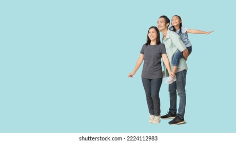Happy asian family of father, mother and daughter hug spread out your arms, isolated on blue background with Clipping paths for design work empty free space - Shutterstock ID 2224112983