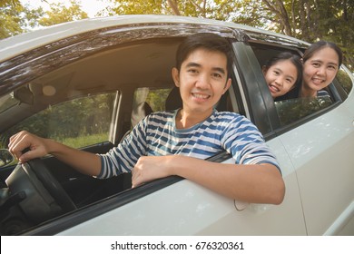 Happy Asian Family On Mini Van Are Smiling And Driving For Travel In Summer, Vintage Filter