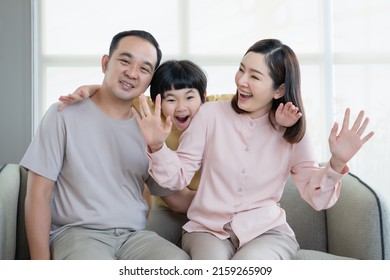 Happy Asian Family With Son Playing At Home And Everyone Having Fun Together At Home.