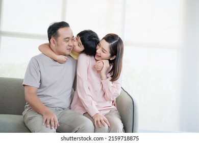 Happy Asian Family With Son Playing At Home And Everyone Having Fun Together At Home.