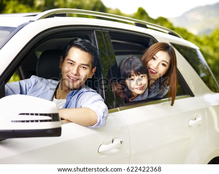 happy asian family traveling by car looking at camera smiling. ストックフォト © 