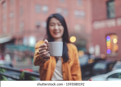 Happy Asian Female Holding Coffee At Portland Pearl District