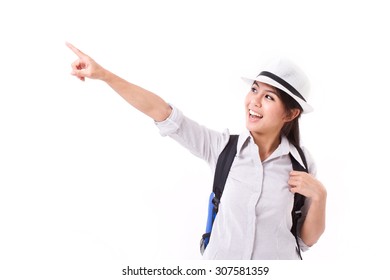 happy asian female traveler pointing up
