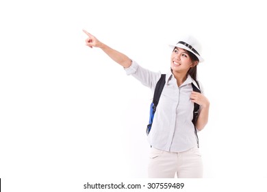 happy asian female traveller pointing up