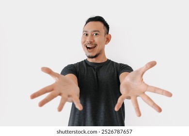 Happy Asian freelance man bun hair in black with thing in hand on white. - Powered by Shutterstock