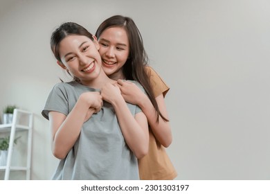 Happy asian girl couple cheerful. Homosexual couple hugging each other in love. LGBT Lesbian couple love.
