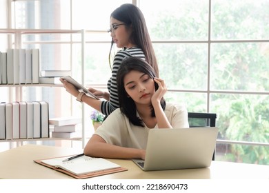 Happy Asian Lesbian Couple Working Together In Office. LGBT Community, Lesbian, Homosexual, Business Concept